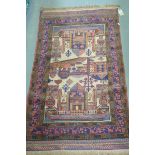 A 20th Century Caucasian rug In shades of red, blue and brown,