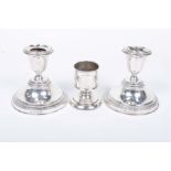 A pair of modern silver dwarf candlesticks Of circular knopped form,