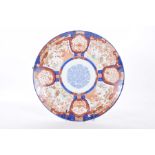 A large Imari charger, late 19th,