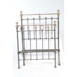 A Victorian painted iron and brass single bed,