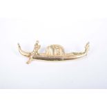 A novelty bar brooch In the form of a Vencian gondola, stamped 750, weight approx 3.