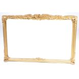 A 19th Century giltwood over mantel mirror With a scrolling leaf crest above a rectangular plate