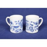 Two 18th Century porcelain blue and white coffee cans Each with a loop handles decorated with