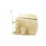 A novelty brass desk tidy,