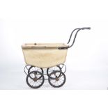 A Victorian style Triang dolls pram With metal frame,