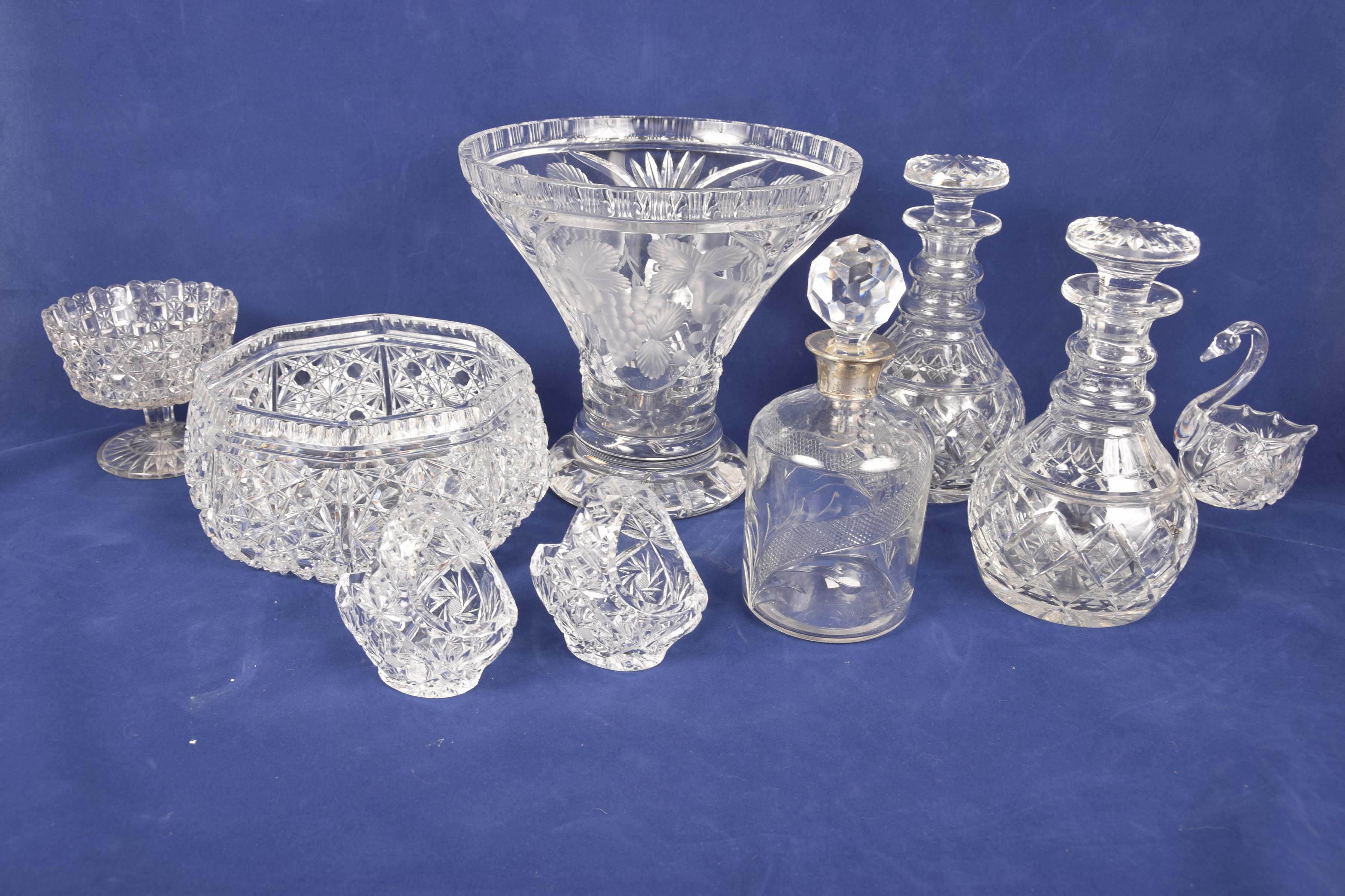 Collection of cut glass, mid-20th century To include a pair of decanters complete with stoppers,