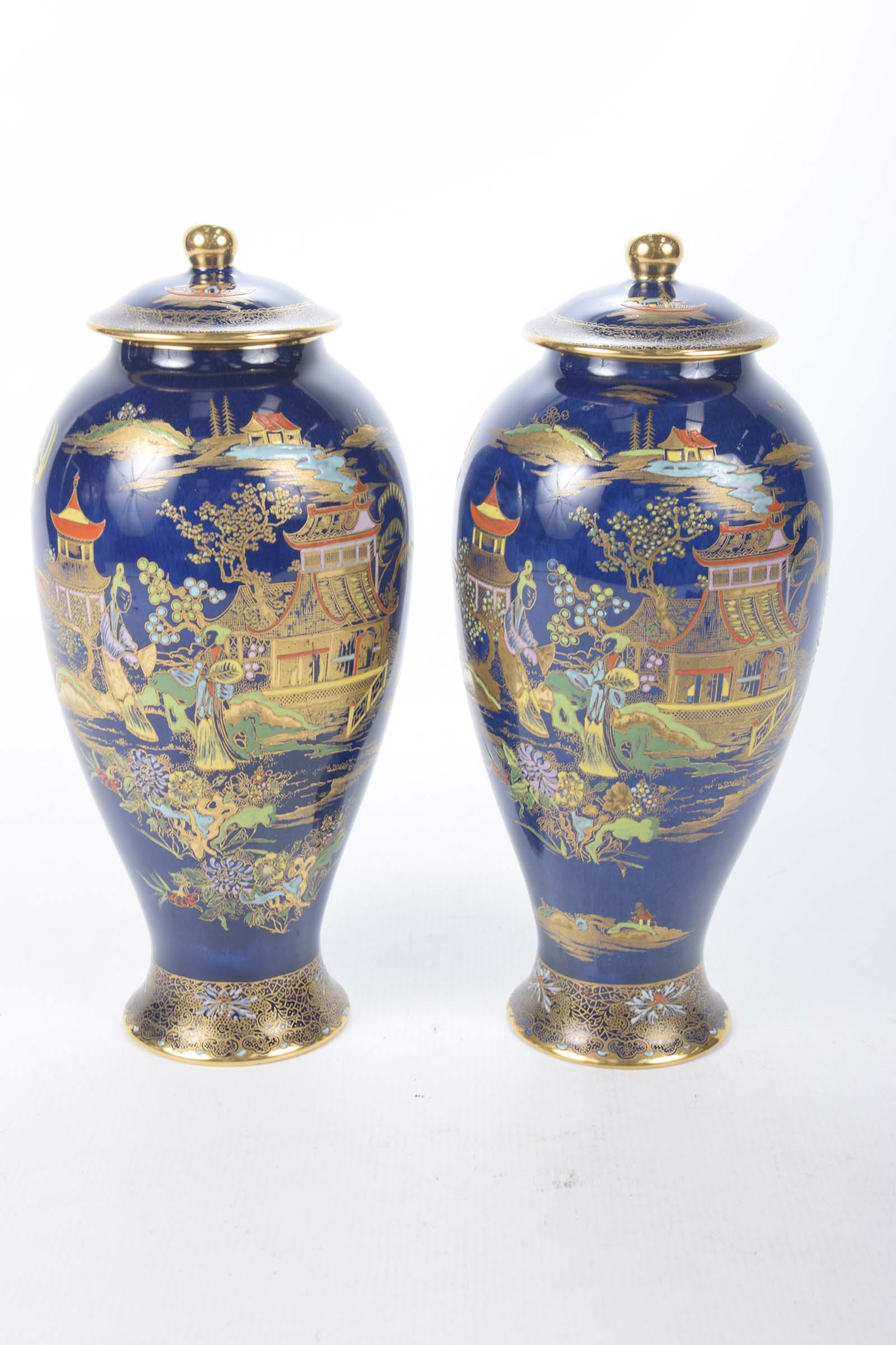 A pair of Carltonware vases and covers,