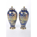 A pair of Carltonware vases and covers,