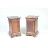 A pair of reproduction mahogany Georgian style pot cupboards by Willis & Gambier Each with a