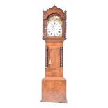 A 19th Century mahogany eight day longcase clock With a painted break arch dial,