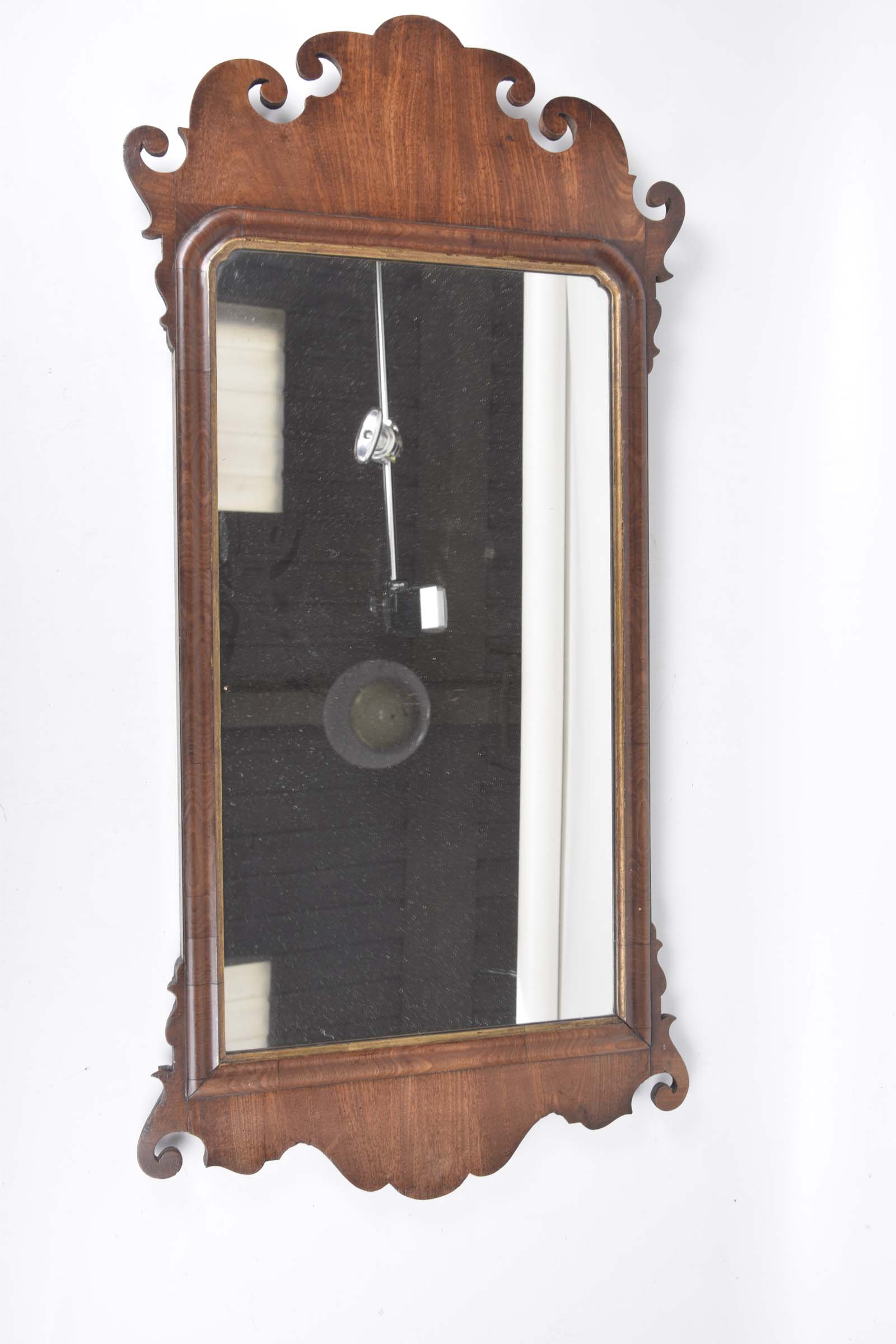 A Chippendale-style mahogany framed wall mirror,
