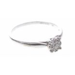 A diamond cluster ring The round brilliant-cut diamond to a brilliant-cut diamond surround,