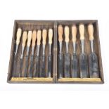 A set of American GE Jennings woodworking bevelled chisels Within a stained hardwood case,