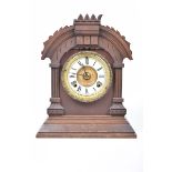 An American walnut cased bracket clock,