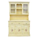 A modern painted pine kitchen dresser The high back with a moulded cornice above a central open