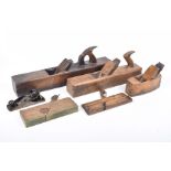 A collection of 19th early 20th Century woodworking planes Including a jack plane stamped B.