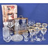 A quantity of glassware Including a cut glass ships decanter with spherical stopper,