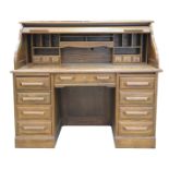 A reproduction medium oak roll top desk, by Oak Creek,