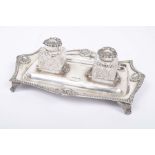 A Victorian silver ink stand The stand of rectangular form,