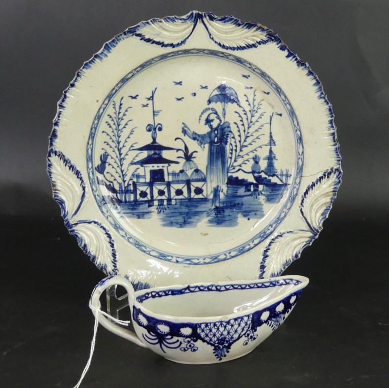 Two pieces of 18th Century Liverpool blue and white To include sauce boat decorated with floral