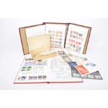 A collection of stamps To include first day covers, loose stamps and three stamp albums,