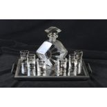 An Art Deco glass seven piece drinking set Comprising diamond shaped decanter, height 22cm,