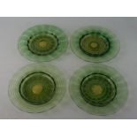 Four James Powell green and clear glass dishes Each of circular form with wavy edges and geometric