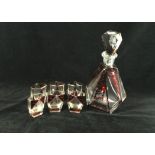 A fine quality Art Deco glass seven piece drinking set Comprising decanter of tapering diamond form,