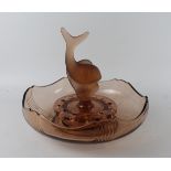 An Art Deco peach glass bowl Having a central moulded glass fish raised on circular flower holder