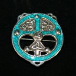 An Arts & Crafts Scottish Provincial silver brooch Having turquoise enamel and Celtic knot
