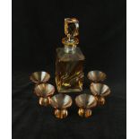 An Art Deco amber and clear glass seven piece drinking set Comprising decanter of square form