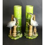 A pair of Bretby Aesthetic movement vases Each modelled in the form of storks beside bamboo,
