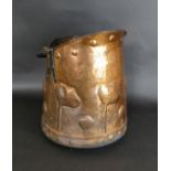 An Arts & Crafts copper log bucket With black metal swing and back handle, possibly Scottish,