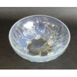 A Rene Lalique opalescent glass bowl Of circular form, decorated in the 'Mistletoe' pattern,