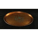 An Arts & Crafts Harold Holmes copper plaque Of oval form,