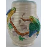 A Clarice Cliff Budgerigar vase Of inverted cylindrical form, relief decorated with two Budgerigars,