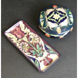 A modern Moorcroft lidded trinket pot and cover Of circular form,