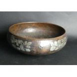 An Arts & Crafts Harold Holmes copper bowl Having rope twist rim and pewter inlaid decoration