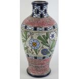 An Art Nouveau Amphora vase of shouldered form Decorated with abstract birds and foliate in