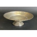 An Art Deco hallmarked silver pedestal bowl With piecrust rim, by Barker Brothers, Chester 1919,