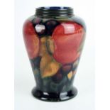 A Walter Moorcroft vase of shouldered form Decorated in the 'Pomegranate' pattern on a blue and