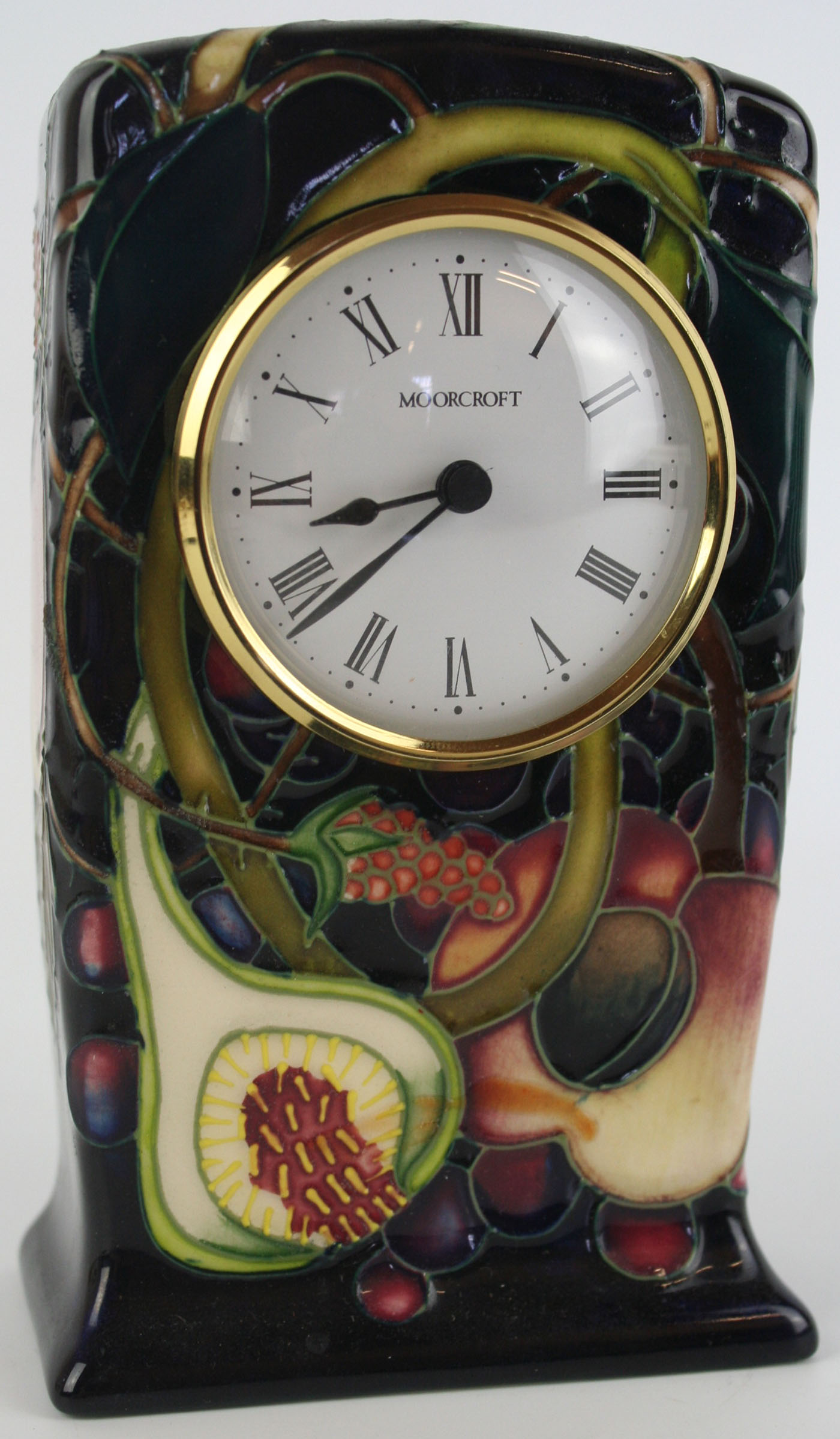 A modern Moorcroft mantle clock Of rectangular form,