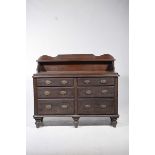 A late Victorian stained pine dresser The raised back with a single shelf above a rectangular