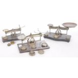 Three sets of postal weighing scales, early 20th century One example by Johnsons of Hendon,