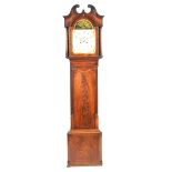 A George III mahogany cased eight day longcase clock The hood with a twin swan neck pediment above