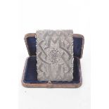 A Victorian Silver card case With scalloped edging and foliate engraved designs with engraved