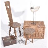 A mixed group of collectables To include a wicker lidded log basket, a carved wooden prayer chair,