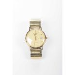 Rotary: A 9k gold quartz wrist watch The circular cream dial with applied gold baton hour markers,