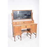 A late Victorian ash dressing table The substantial rectangular mirror supported on channelled