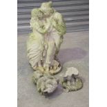 Two reconstituted stone figure groups The first two small children raised on a naturalistic base,